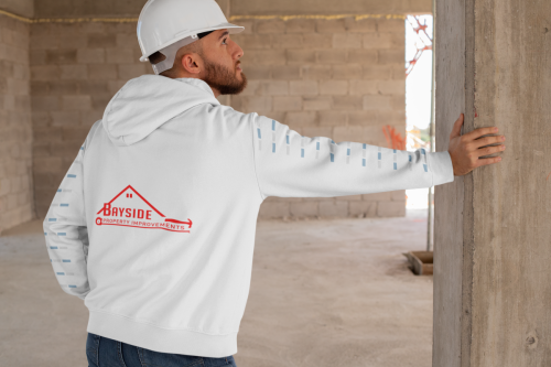 hoodie-mockup-with-printed-sleeves-featuring-a-man-at-a-construction-site-31541
