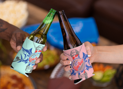 koozie-mockup-featuring-two-friends-making-a-toast-with-beer-m20400